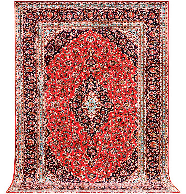 A Kashan carpet, a. 360 x 245 cm.