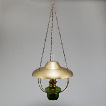 a paraffin ceiling light, brass and glass.