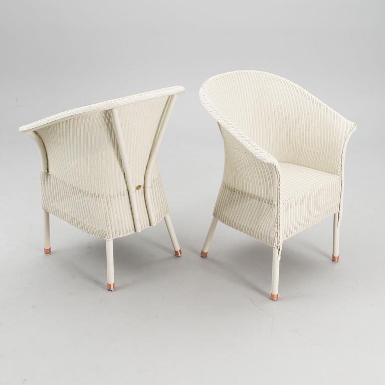 A PAIR OF ARM CHAIRS, Lloyd Loom, Spalding, England,  21st century.