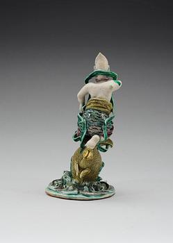 A famille verte figurine of a sea deamon, Qing dynasty, Kangxi (1662-1722).