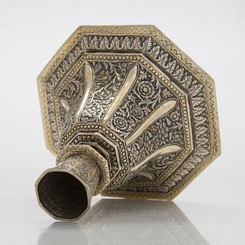 A parcel-gilt silver repoussé water pipe huqqa base, 18th/19th Century.