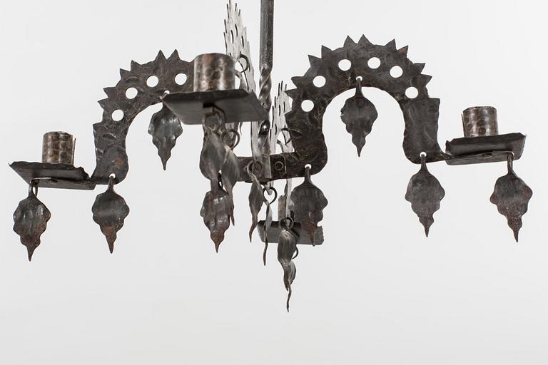 A FOLKLORE LAMP 20TH CENTURY.