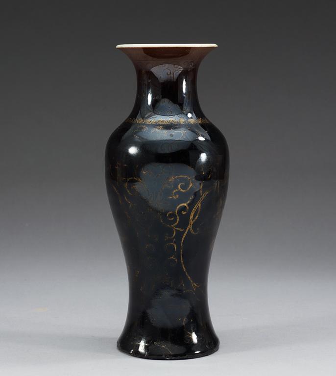 A black vase decorated in gold, Qing dynasty, Qianlong (1736-95).