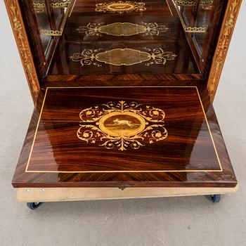 A mid 1900s European bar cabinet.