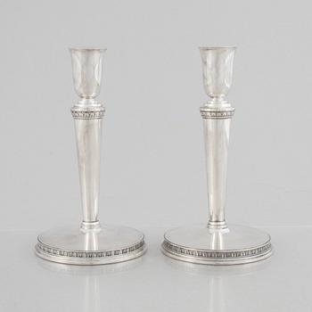 Eric Råström, a pair of silver candlesticks, Råströms Silver- O Nysilverfabrik , Stockholm 1957.