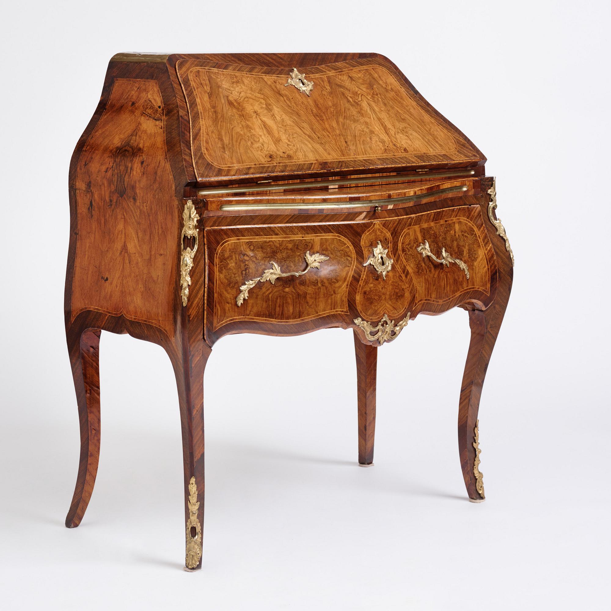 A rosewood, walnut, and gilt brass-mounted rococo secretaire by J. H. Reimers (master in Stockholm 1754-73).