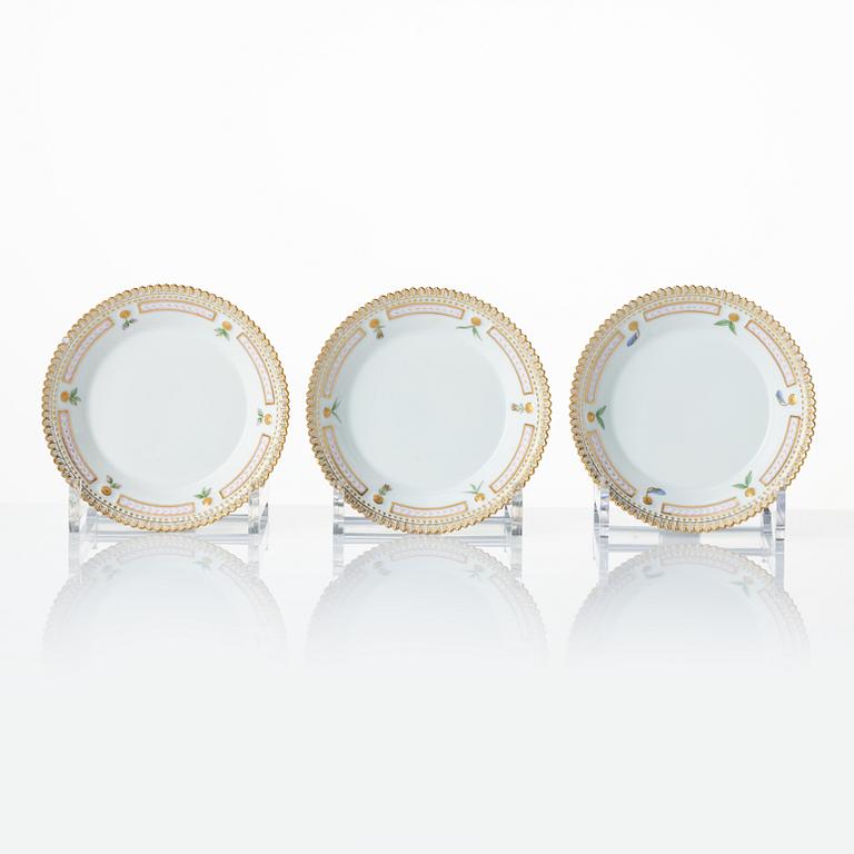 A set with a Royal Copenhagen 'Flora Danica' triangular dish, a sugar bowl with cover and three small dishes, Denmark,