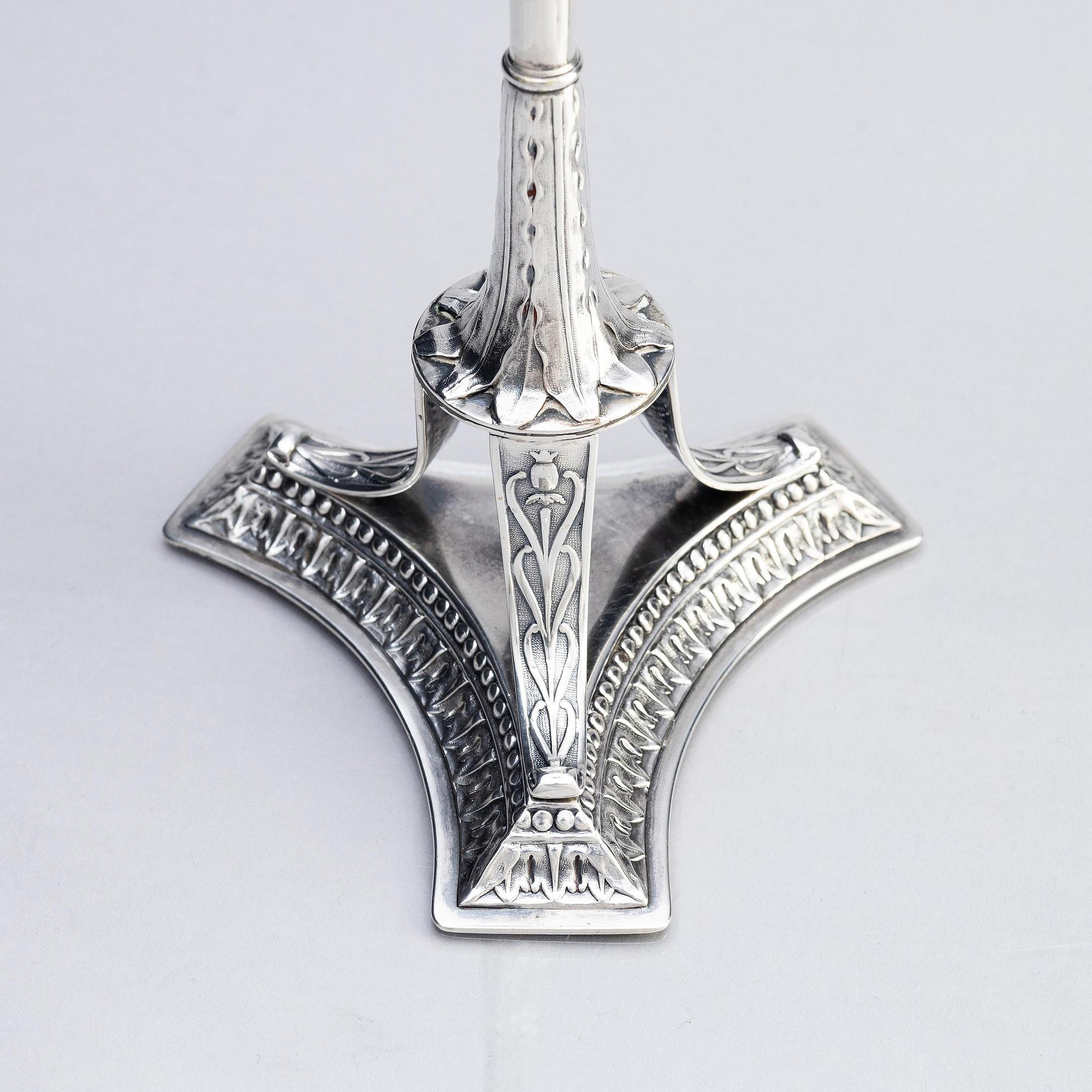 A pair of Swedish early 19th century silver candlesticks, marks of Adolf Zethelius, Stockholm 1817.