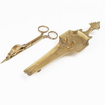 A Swedish/North European baroque brass wick snuffer and tray, circa 1700.