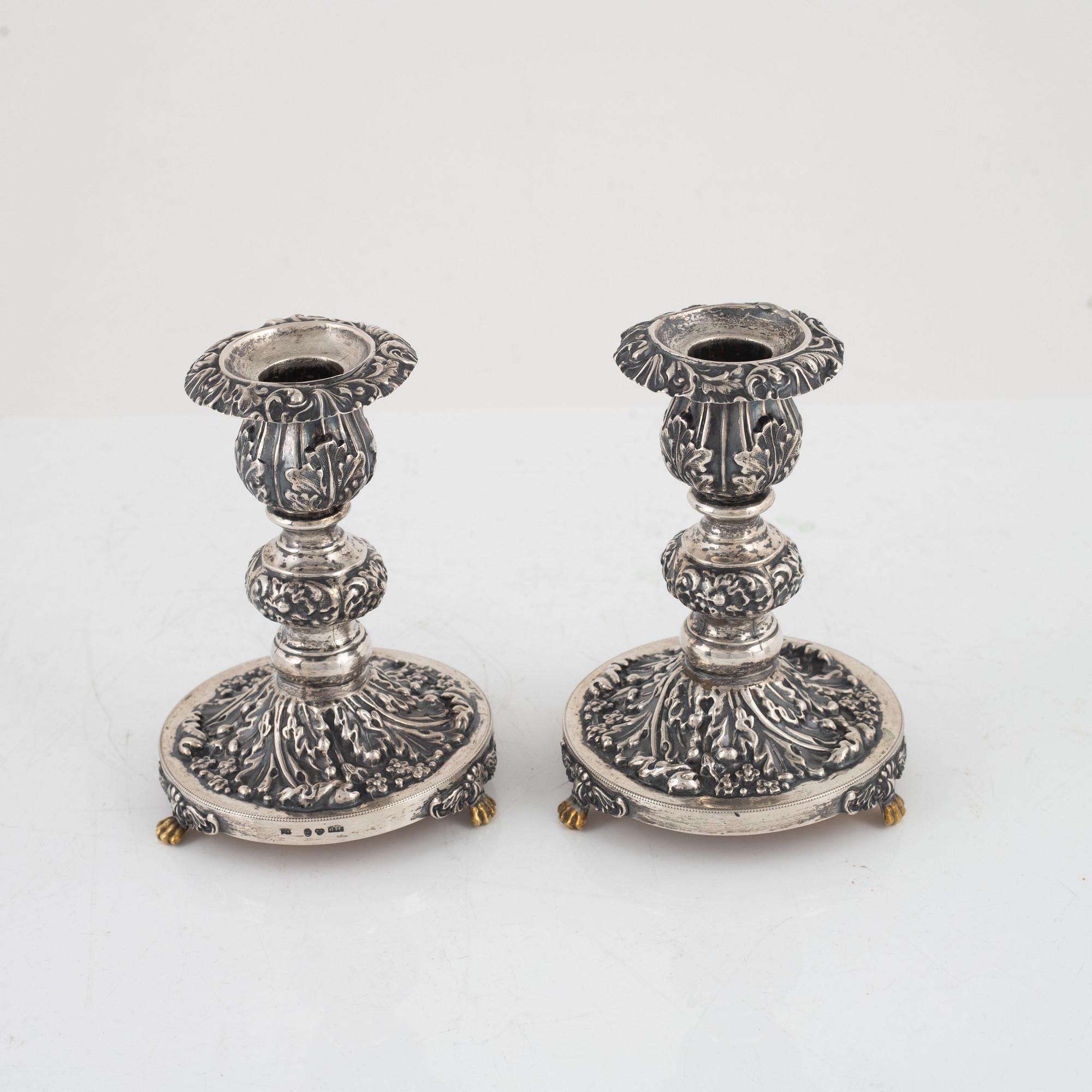 Candlesticks, a pair, Gustaf Möllenborg, Stockholm 1844, and two salt cellars including CG Hallberg, Stockholm 1897.