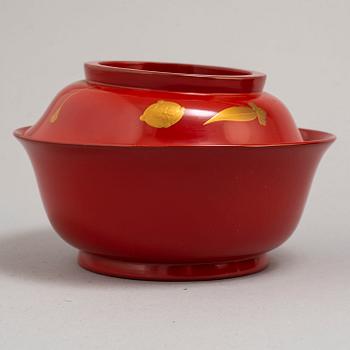 Eight lacquered bowls with covers, Japan, 20th century.