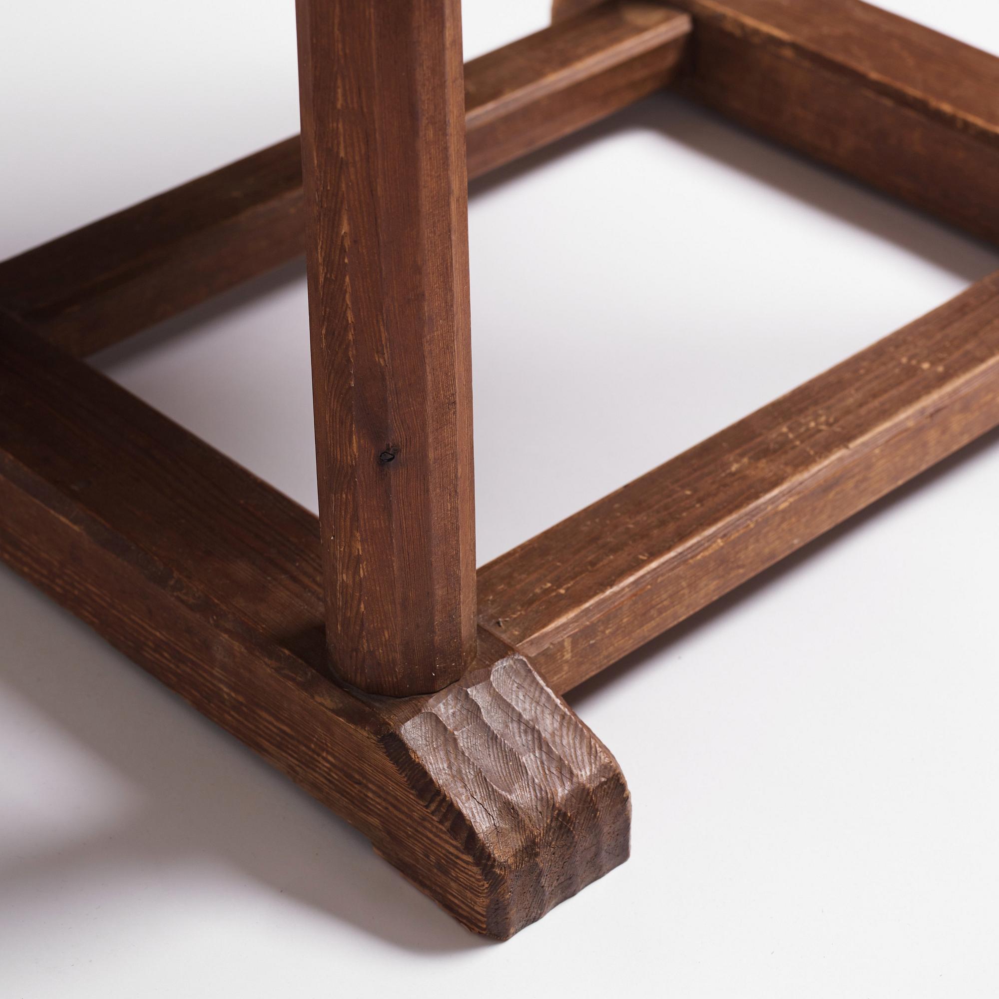 Axel Einar Hjorth, a stained pine and limestone top "Sandhamn" table, Nordiska Kompaniet, Sweden 1931.