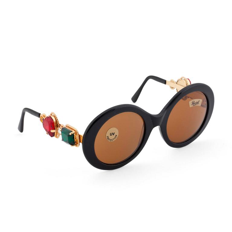 MOSCHINO, a pair of sunglasses.