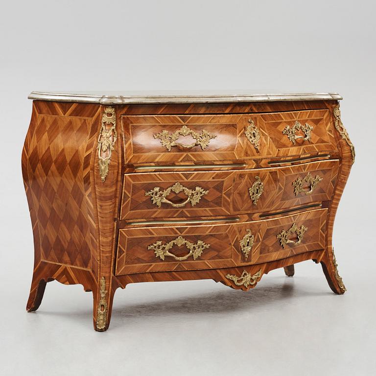 A rococo  gilt-brass mounted and rosewood parquetry commode by J. H. Reimers (master in Stockholm 1754-73).