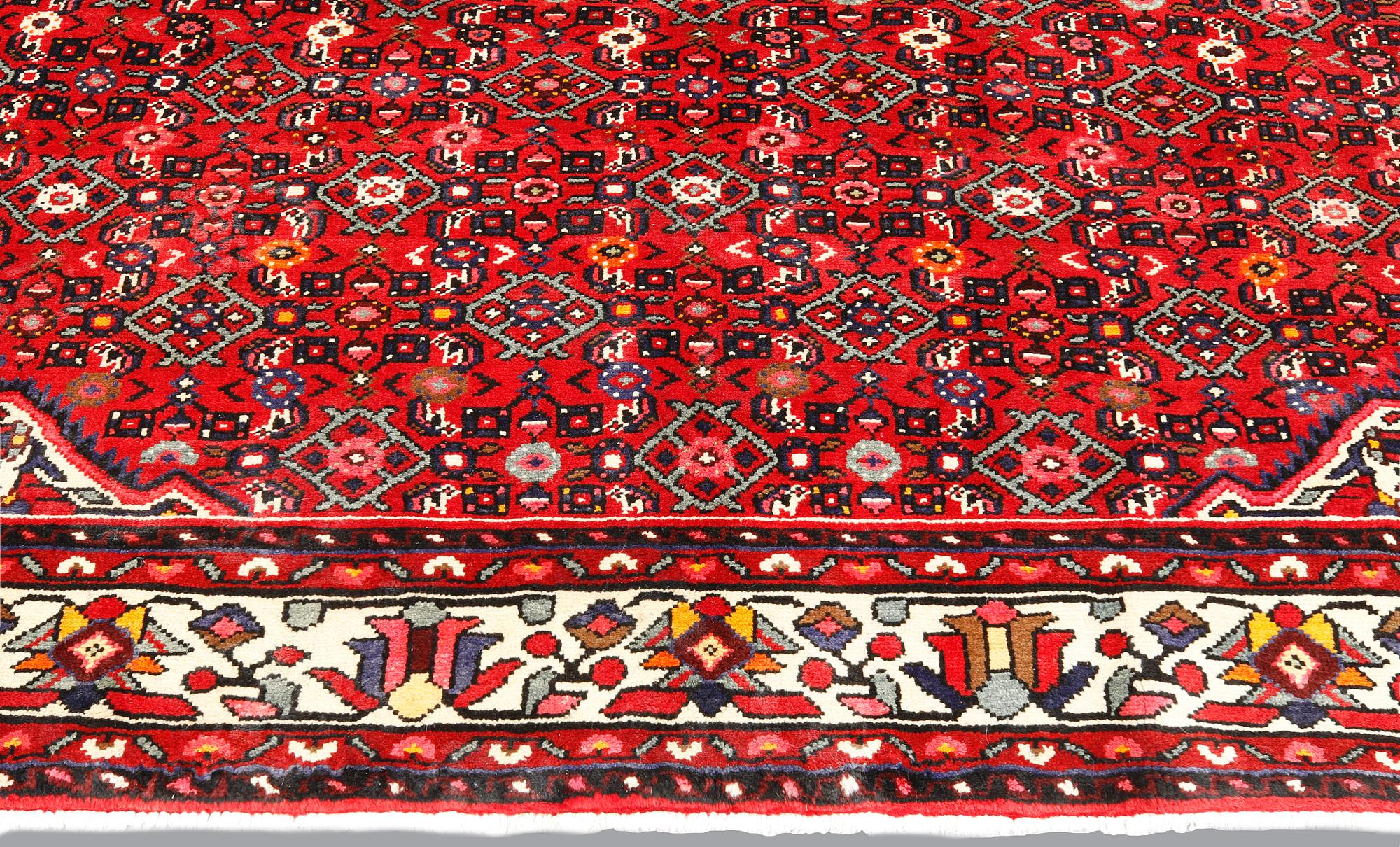 A Hosseinabad carpet, c 301 x 215 cm.