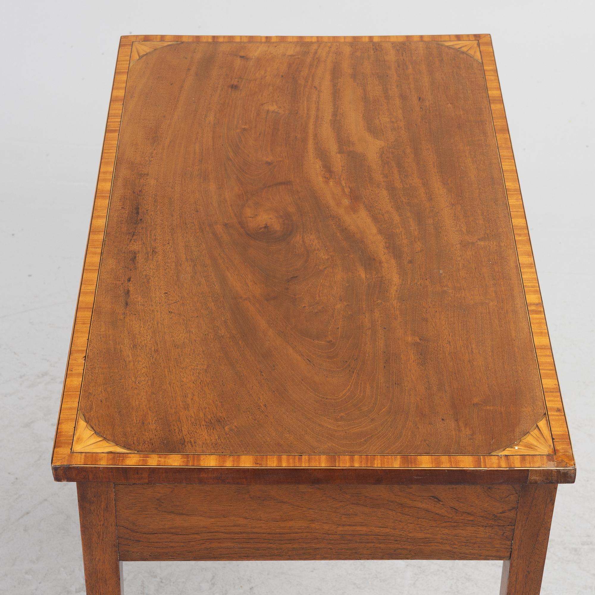 A table, England, circa 1900.