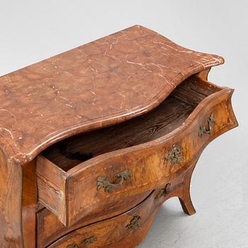 A rococo chest of drawers, mid 18th Century.