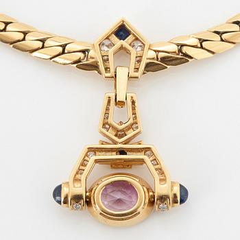 A Cartier necklace in 18K gold set with a pink sapphire and round brilliant-cut diamonds.