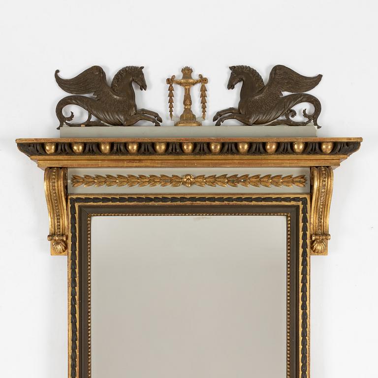 A Empire style mirror, late 19th Century.