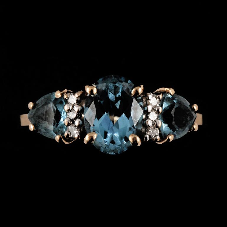 RING, 14k guld med 3 fasettslipade turmaliner samt 6 briljantslipade diamanter. Vikt 3 g.
