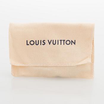 Louis Vuitton, "Fasten your LV" bracelet. Marked Louis Vuitton Paris, Made in Spain.