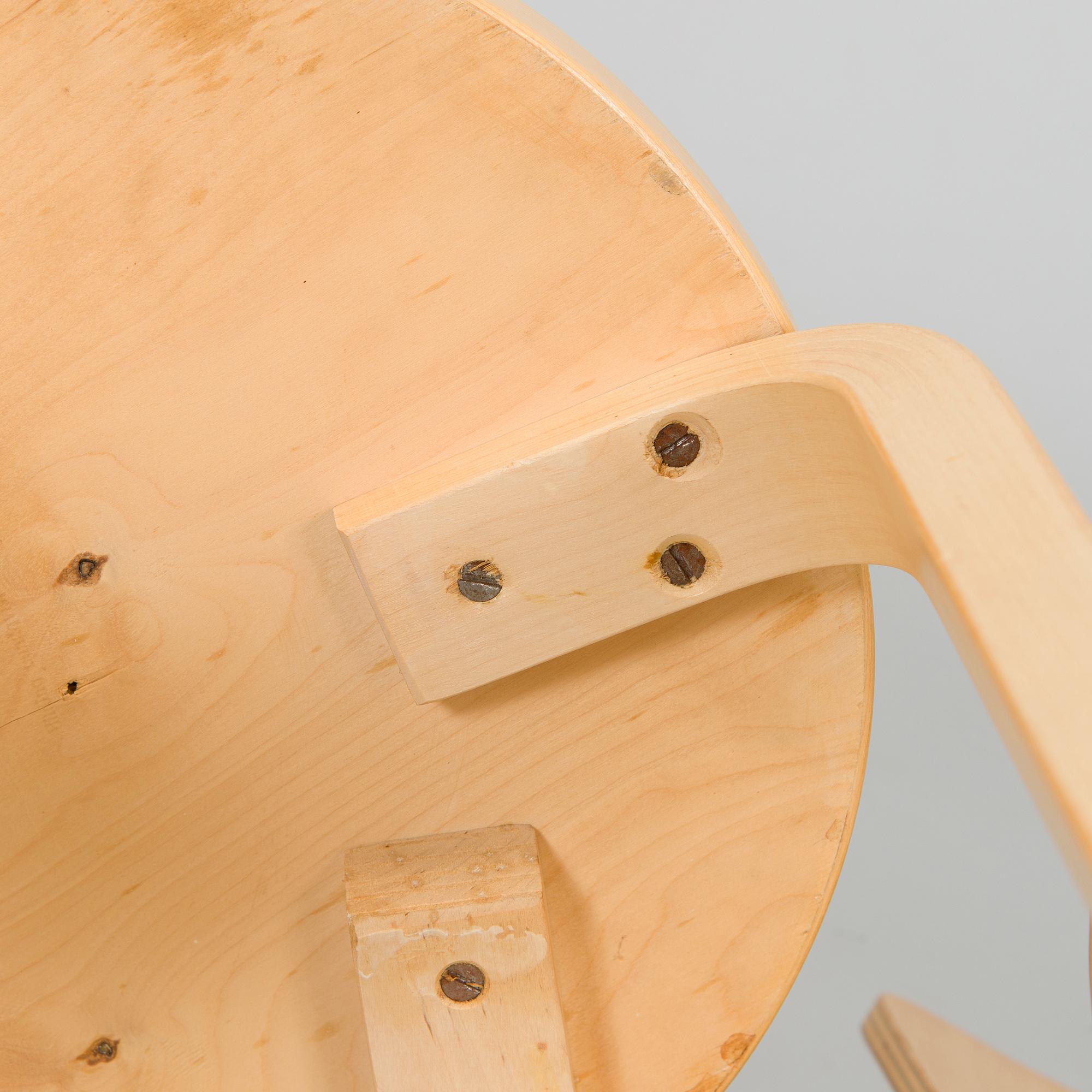 Alvar Aalto, A mid-20th century drop leaf table and three chairs for O.Y. Huonekalu-ja Rakennustyötehdas A.B.