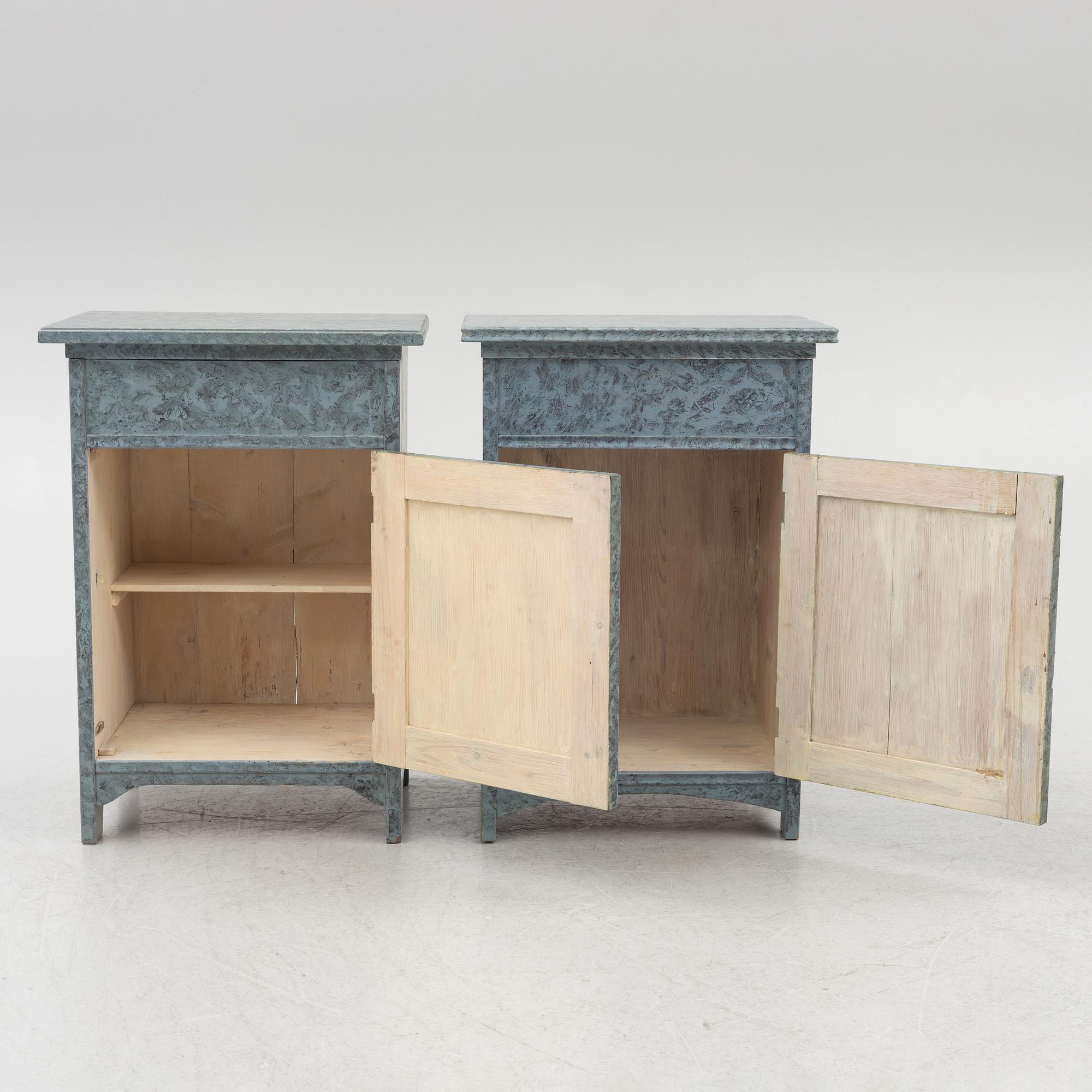 A matched pair of bedside tables, 20th century.