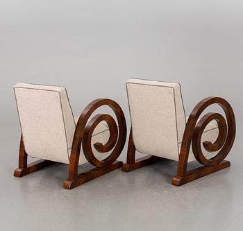 A pair of Art Deco armchairs.