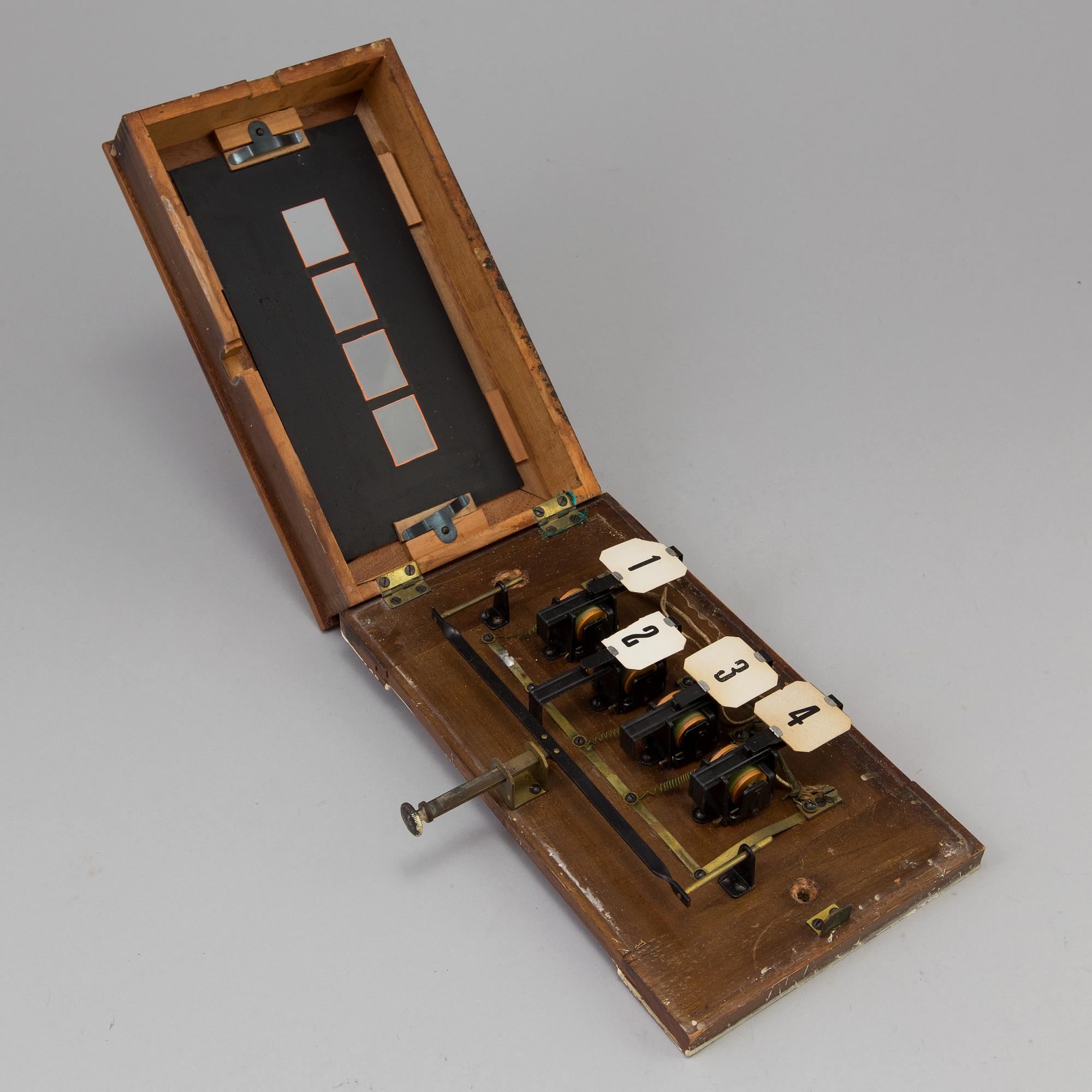 A 20th century servants bell box for four rooms.
