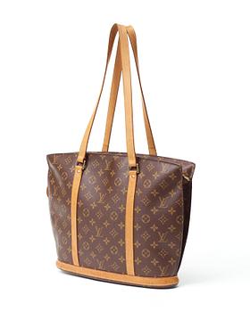 601. A monogram canvas handbag by Louis Vuitton,