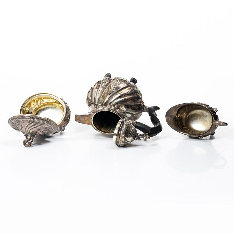 C.G. Hallberg, A three piece Roccoco style silver coffee service, Stockholm 1946.
