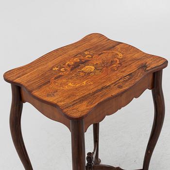 A Rococo style rosewood-veneered and mahogany sewing table, early 20th century.