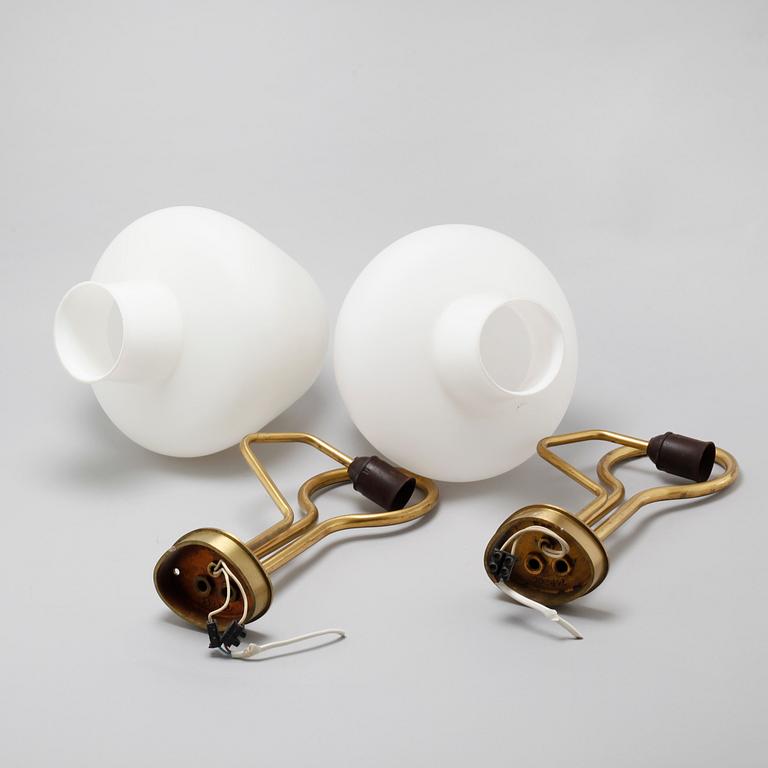 A pair of wall lamps from ASEA, around the mid 20th century.