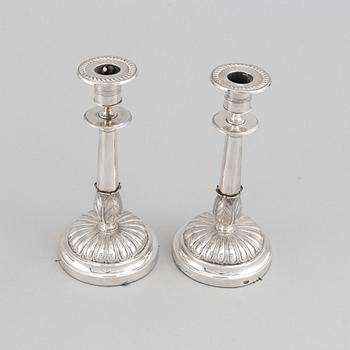 Gustaf Möllenborg, a pair of silver empire candlesticks, Stockholm 1829.