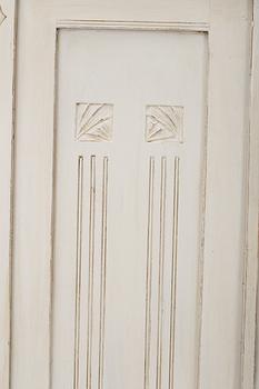 A wardrobe, circa 1900.