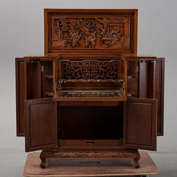 A 20th century chinese bar cabinet.