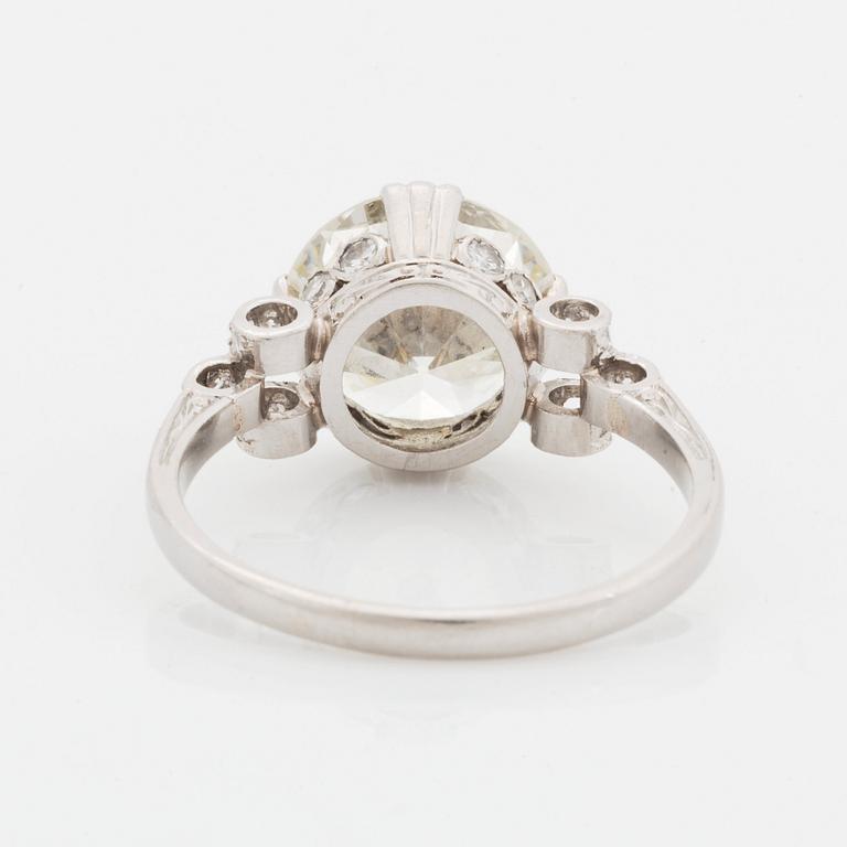 A platinum ring set with an old-cut diamond weight ca 3.00 cts quality ca J/K vs.