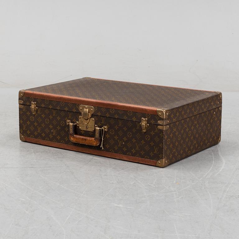 Louis Vuitton, a monogram canvas 'Bracken' suitcase, mid 20th Century.