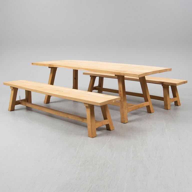 A contemporary oak table and two benches from Garbo Interiors.