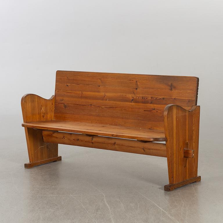 A 20th century Swedish stained pine sofa.