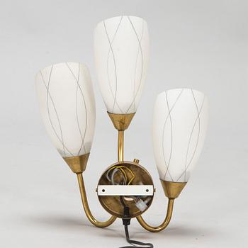 A mid 20th century wall lamp for Itsu Finland.