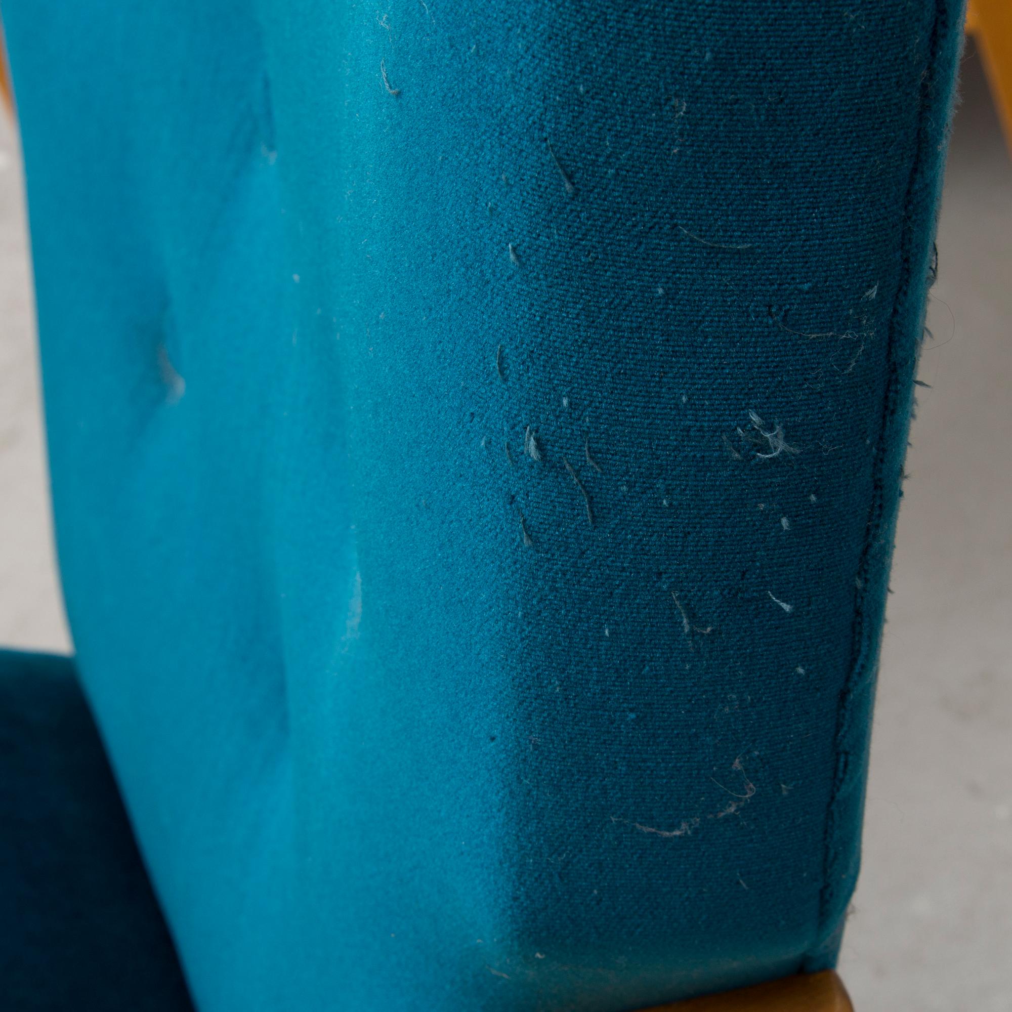 A pair of mid 20th century '2402 Armi' armchairs by Ilmari Lappalainen/Olavi Lieto, Asko, Finland.