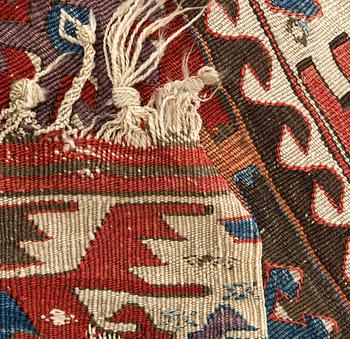 A pair of antique Karman Anatolia Kilims ca 277 x 87 and 261 x 84 cm.