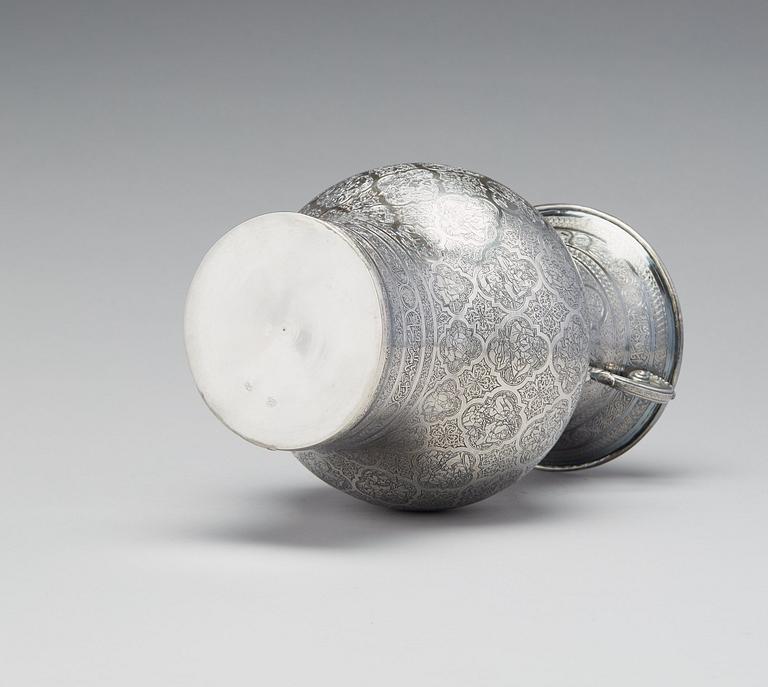 A persian silver two handled vase from the late Qajardynasty.