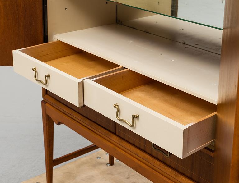 A mid 20th Century bar cabinet.