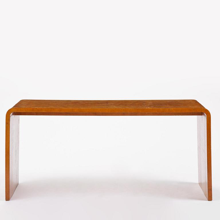 Swedish Modern, a birch veneered coffee table, 1930s-40s.