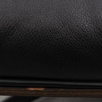 Charles & Ray Eames, an "Eames Lounge Chair" with ottoman, Vitra, 21st century.