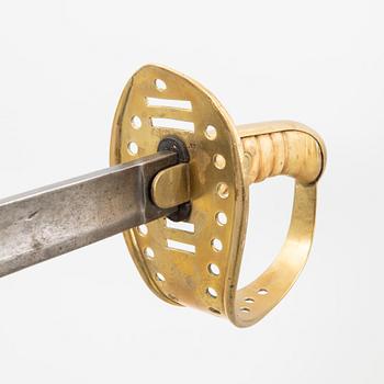 Two Swedish cavalry swords 1867 pattern, one with scabbard.