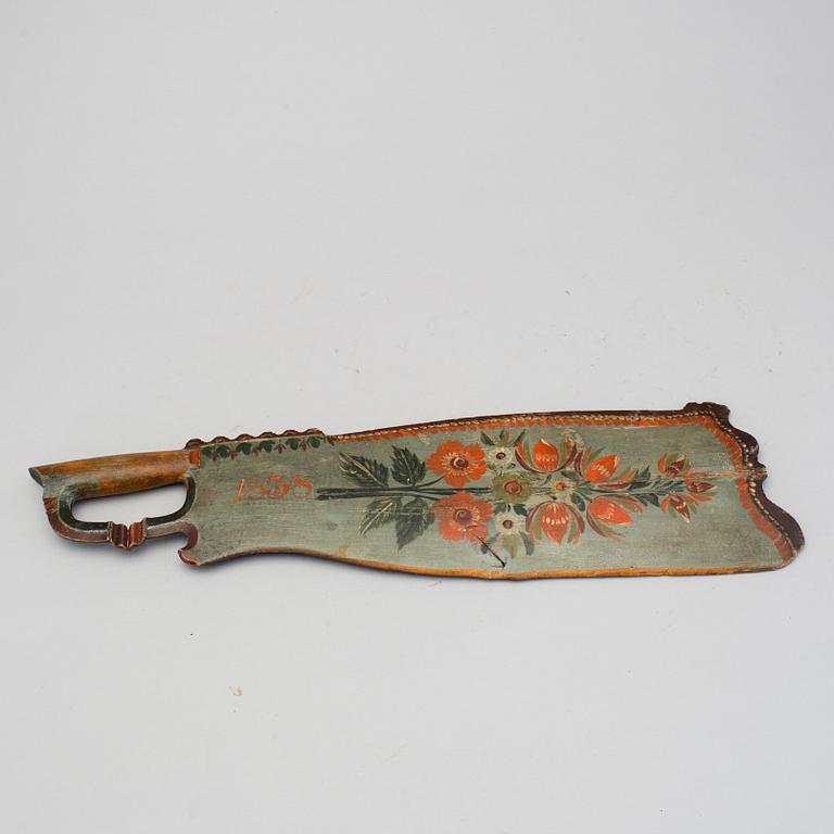 A painted traditional folk art skäktkniv from Norrala Hälsingland dated 1838.