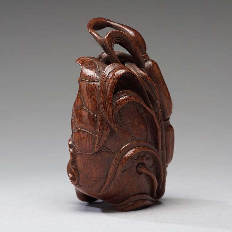 A bamboo carving of a crab and lotus, late Qing dynasty.